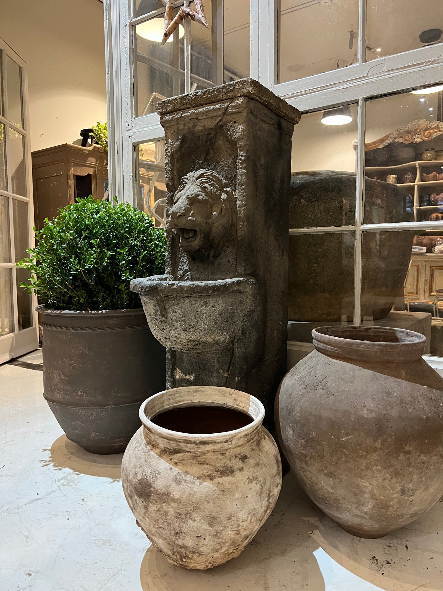 Lion fountain, cast stone